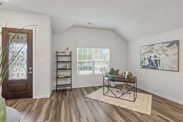 office area with lofted ceiling and dark hardwood / wood-style floors