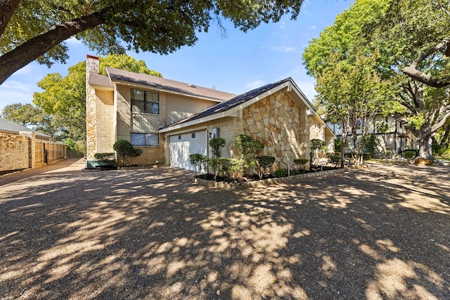 exterior space with a garage