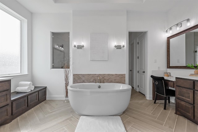 bathroom with vanity, parquet flooring, and plus walk in shower