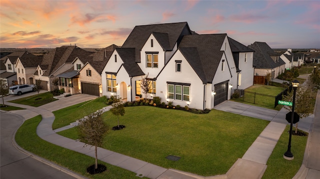 view of front of house with a yard