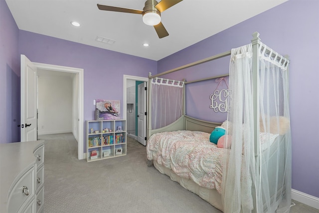 carpeted bedroom with ceiling fan