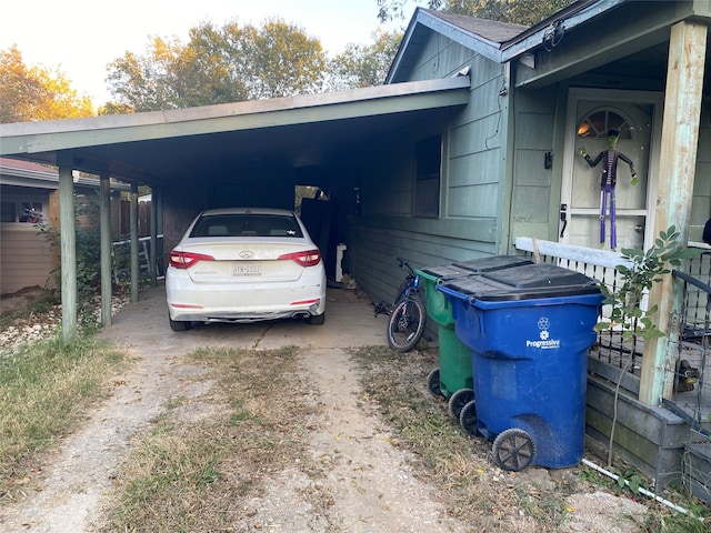 view of home's exterior featuring a carport