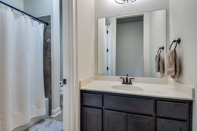 bathroom featuring vanity and shower / bath combo