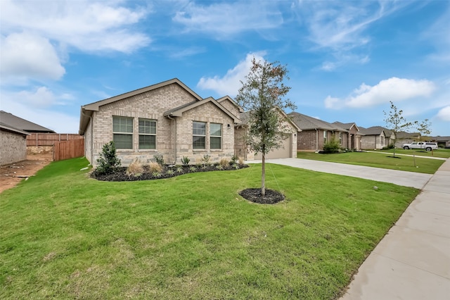 view of front of house with a front lawn and a garage