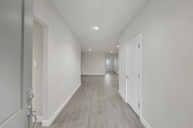 hallway featuring light wood-type flooring