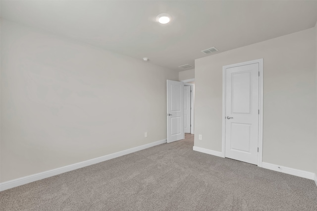 unfurnished bedroom featuring carpet