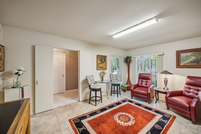 living room with light tile patterned floors