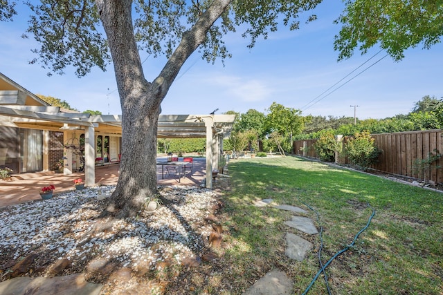 view of yard featuring a patio and a pergola