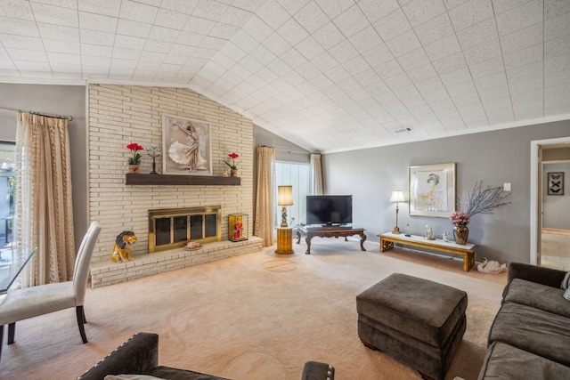 carpeted living room featuring vaulted ceiling and a fireplace