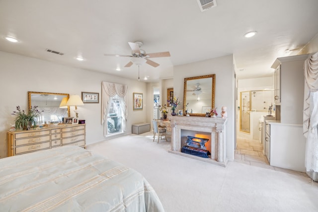 carpeted bedroom featuring ceiling fan