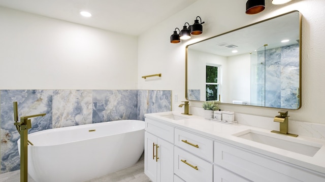 bathroom featuring vanity, hardwood / wood-style flooring, and separate shower and tub