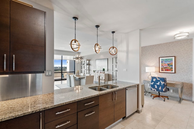 kitchen with light stone countertops, dishwasher, pendant lighting, dark brown cabinetry, and sink