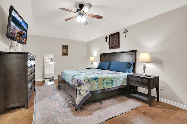 tiled bedroom with ceiling fan