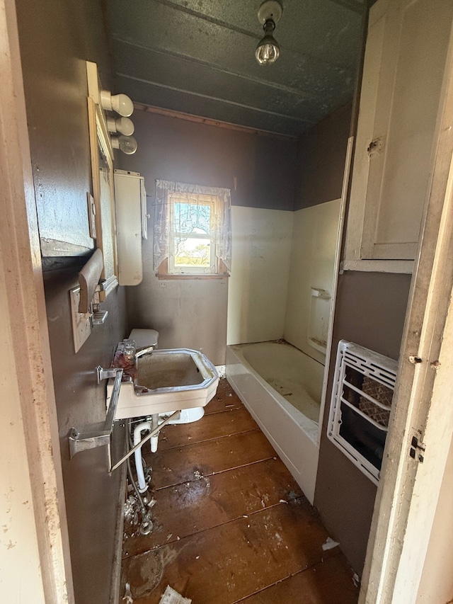 bathroom with sink and heating unit