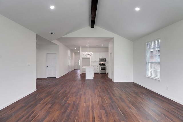 unfurnished living room with vaulted ceiling with beams, dark wood-type flooring, and a notable chandelier