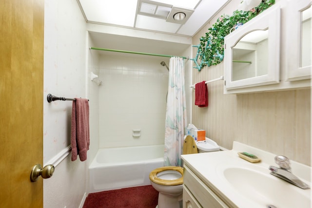 full bathroom featuring vanity, shower / tub combo, and toilet