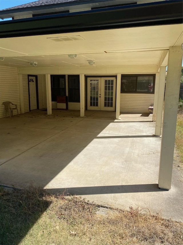 406 Rita Ln, Duncanville, TX 75116 - view of patio / terrace with french doors and a carport