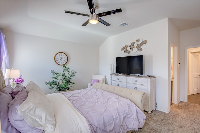 bedroom featuring ceiling fan, light carpet, and lofted ceiling