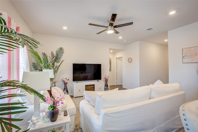 living room with ceiling fan