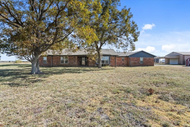 ranch-style home with a front yard