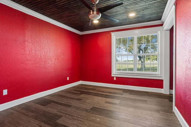 spare room with crown molding and hardwood / wood-style floors