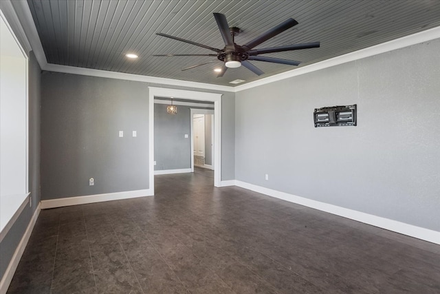 spare room with crown molding, wood ceiling, and ceiling fan