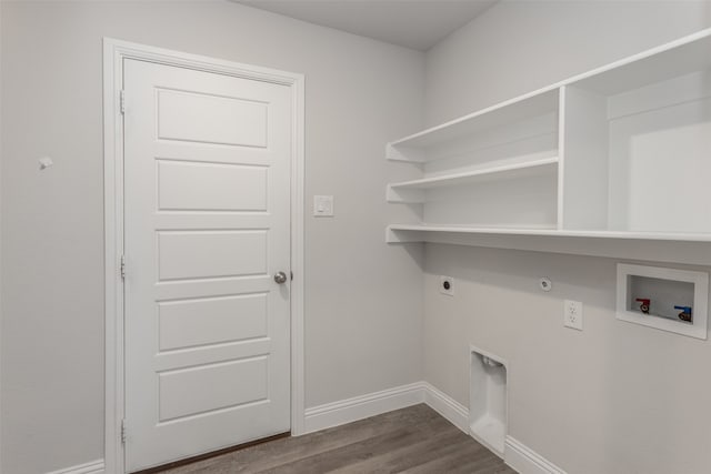 clothes washing area featuring hookup for a washing machine, hookup for an electric dryer, gas dryer hookup, and dark hardwood / wood-style floors