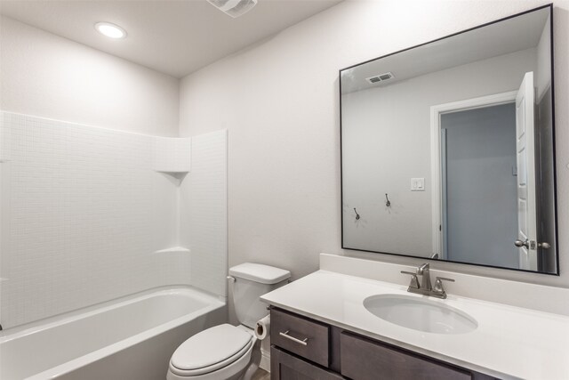 full bathroom with bathtub / shower combination, vanity, and toilet