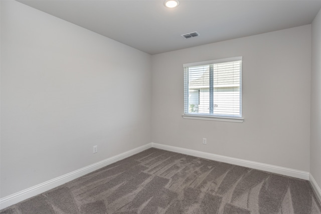 spare room with carpet floors