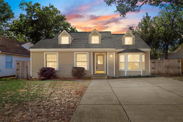 view of new england style home