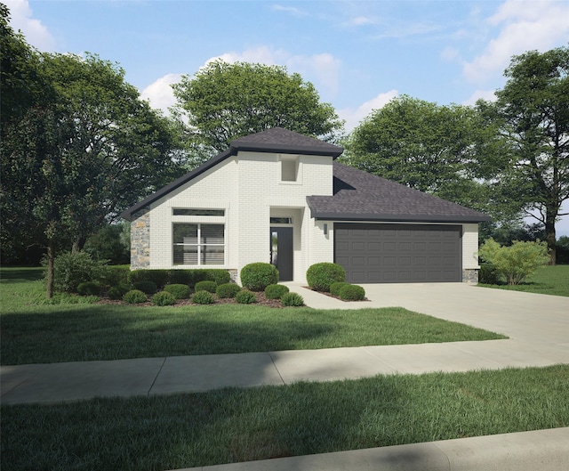 prairie-style home featuring a front lawn and a garage