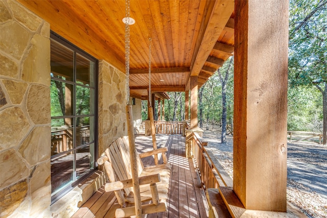 wooden terrace with covered porch