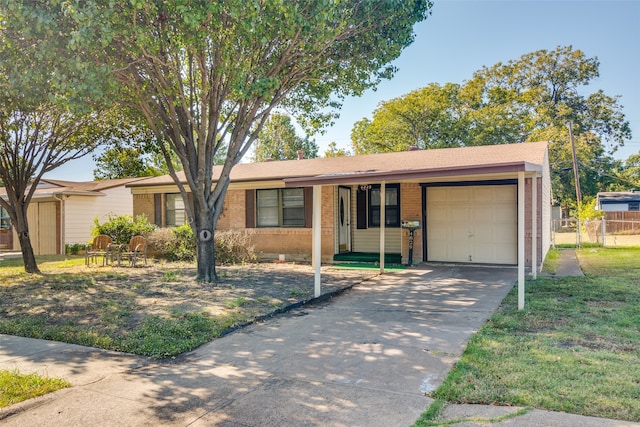 ranch-style home with a front lawn and a garage