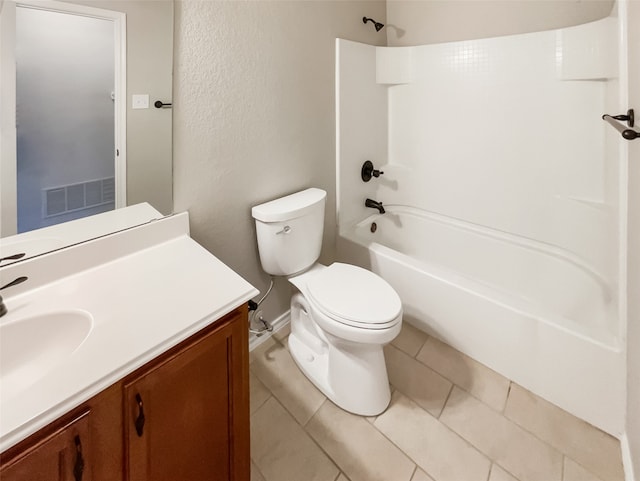 full bathroom with toilet, vanity, tile patterned floors, and washtub / shower combination