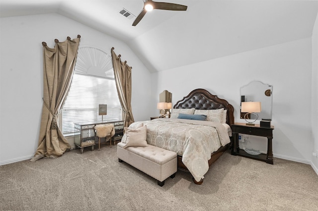 carpeted bedroom with lofted ceiling and ceiling fan