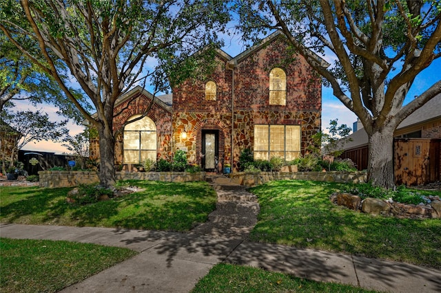 view of property with a lawn