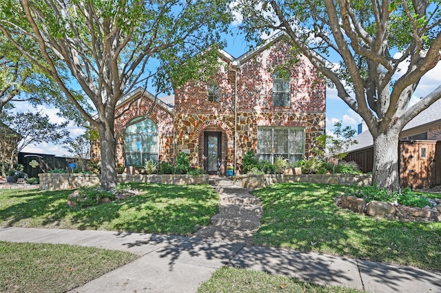 view of front of property with a front lawn