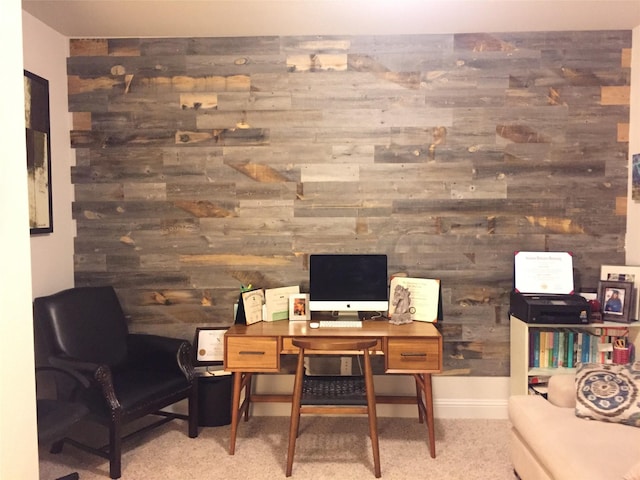 office area with wood walls