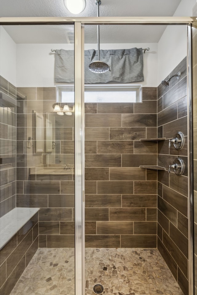 bathroom with walk in shower