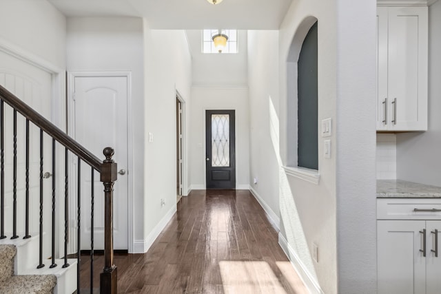 foyer featuring dark hardwood / wood-style floors