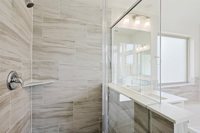 bathroom featuring an enclosed shower