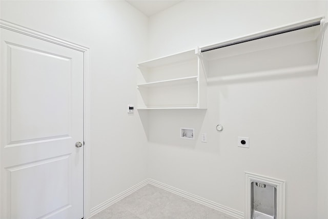 clothes washing area with washer hookup, hookup for an electric dryer, and gas dryer hookup