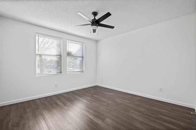 unfurnished room with ceiling fan, a textured ceiling, and dark hardwood / wood-style flooring