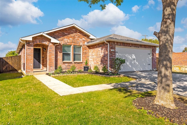 single story home featuring a front yard and a garage