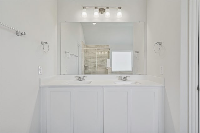 bathroom with an enclosed shower and vanity