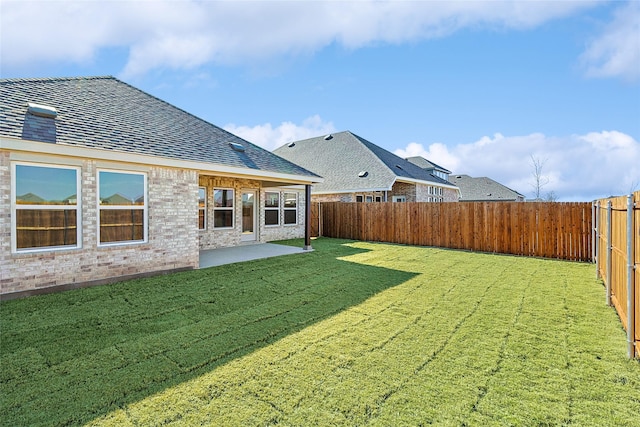 view of yard with a patio area