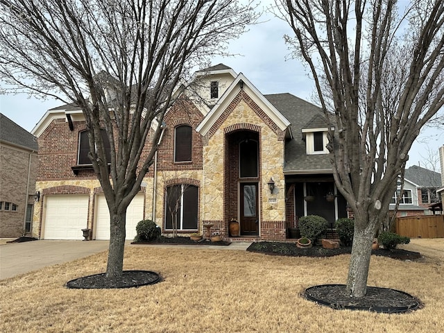 view of front of home featuring concrete driveway, brick siding, roof with shingles, and an attached garage