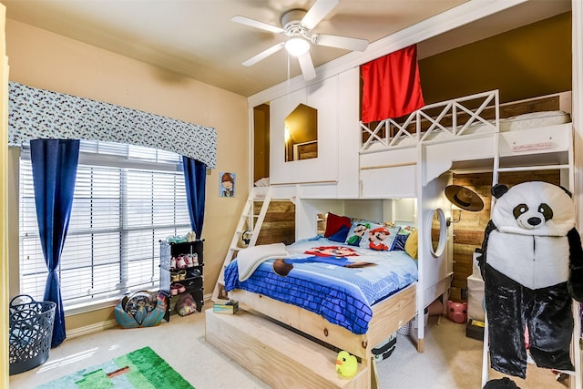 bedroom with baseboards, ceiling fan, and carpet floors