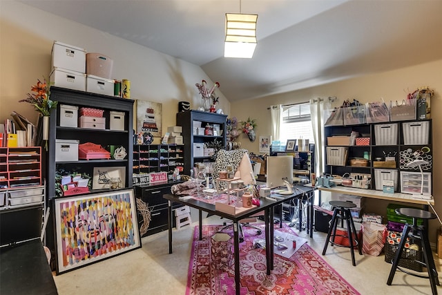 office area with vaulted ceiling and carpet floors