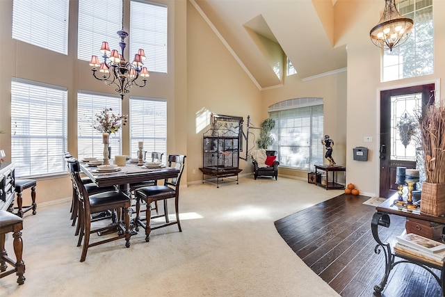 3048 S Camino Lagos, Grand Prairie, TX 75054 - carpeted dining room featuring a chandelier, high vaulted ceiling, baseboards, and crown molding